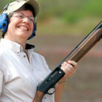 Janet Napolitano Holding Gun