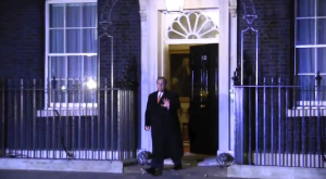 Chris Christie leaves a meeting with the Prime Minister.