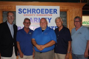 Schroeder (center) making Jim Whelan (left) proud as a peach.